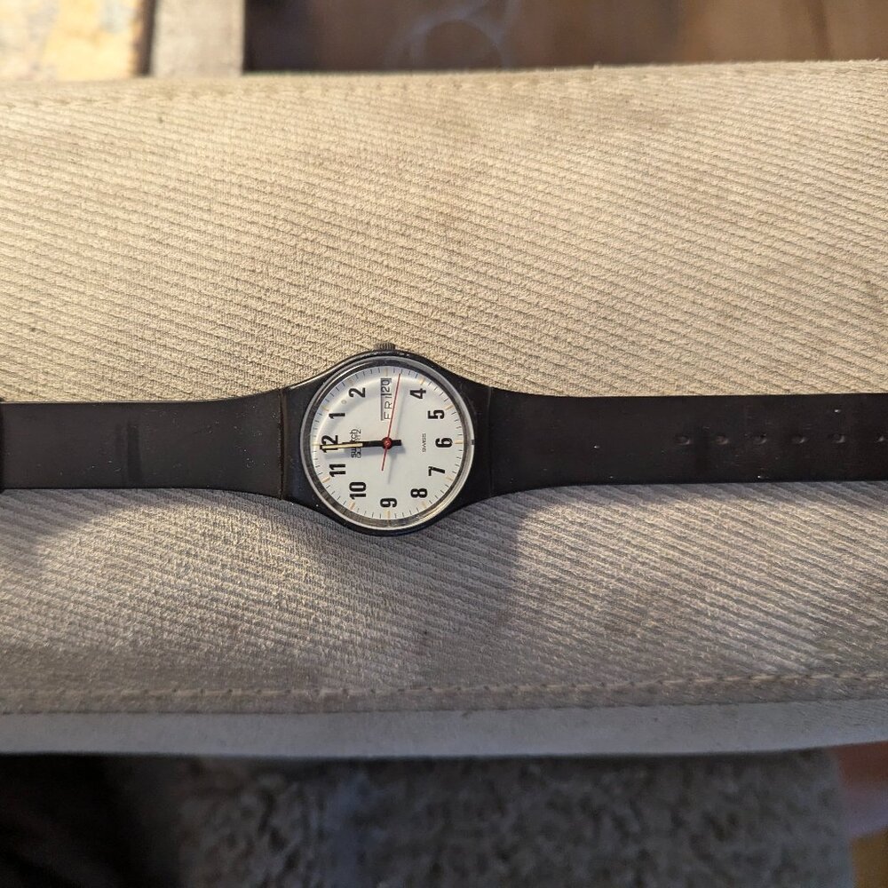 Vintage Swatch black 32mm case white dial, new battery working day date